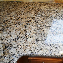 Venetian Ice Granite On Medium Colored wood - Products
