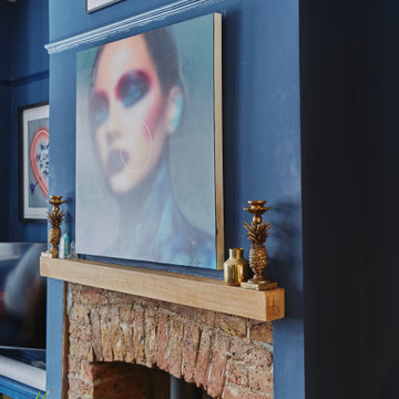Blue colour drenched maximalist lounge