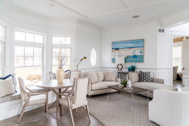 Inspiration for a coastal dark wood floor and shiplap wall living room remodel in Baltimore with white walls