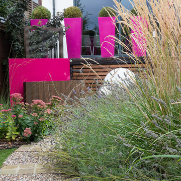 Tall grasses and lavender give movement and texture to the garden