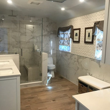 White Master Bath using a mix of Quartz, Porcelain tile and Natural stone mosaic