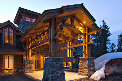 Large rustic two-story mixed siding exterior home idea in Albuquerque