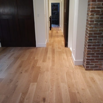blended heights at various doorways to make the floor appear 'level' work of art
