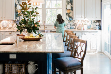 Inspiration for a large timeless l-shaped medium tone wood floor, brown floor and vaulted ceiling eat-in kitchen remodel in Baltimore with a double-bowl sink, recessed-panel cabinets, gray cabinets, quartzite countertops, blue backsplash, cement tile backsplash, white appliances, an island and gray countertops