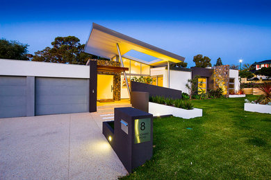 Photo of a large contemporary one-storey exterior in Perth.