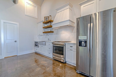 Example of a transitional kitchen design in Houston