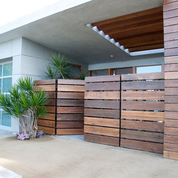 Entry courtyard adds privacy while allowing natural ventilation.