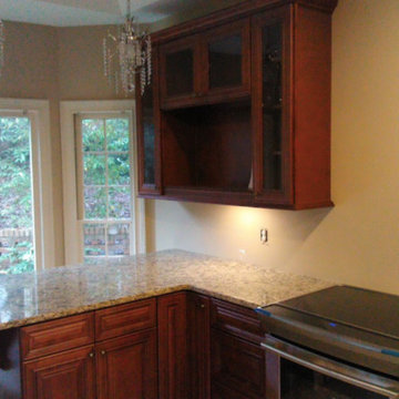 Cabinet and floor install - TV cabinet, stove, and light fixture install
