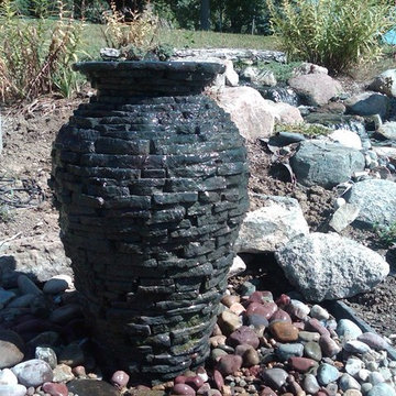 Fountainscapes: Bubbling Boulder, Spilling Urns, and Other Vignette Fountains
