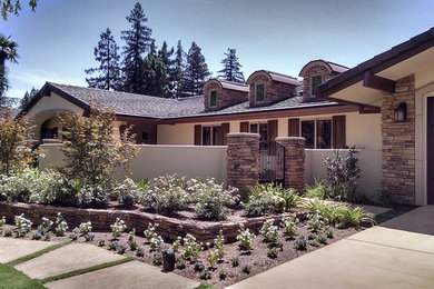 Mid-sized transitional beige one-story stucco gable roof photo in San Luis Obispo