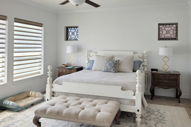 Example of a transitional bedroom design in Austin
