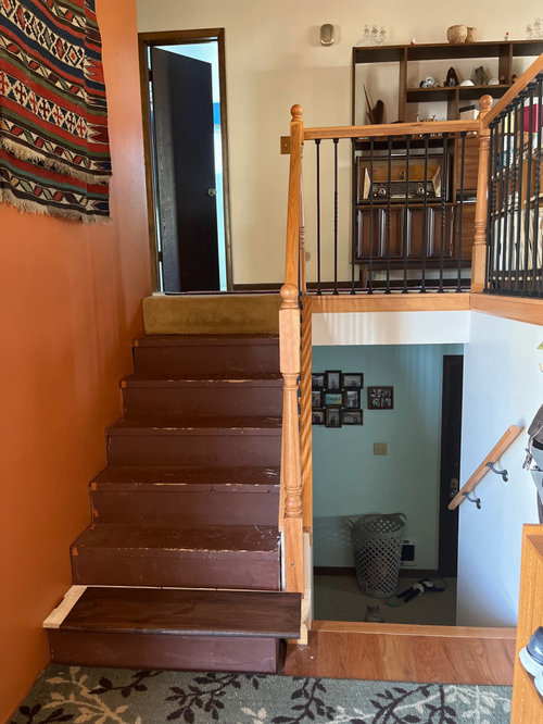 Stair treads different color than floor plus trim and banister help!!!