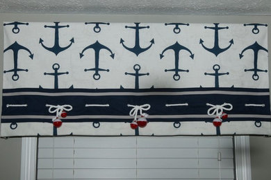 Inspiration for a mid-sized coastal carpeted bedroom remodel in Other with gray walls