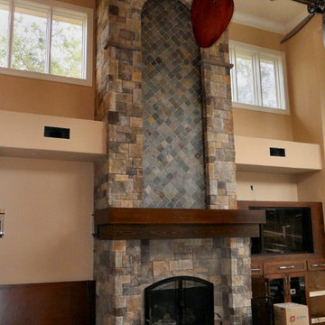 Incredibly intricate stone work makes this fireplace a focal point of the home