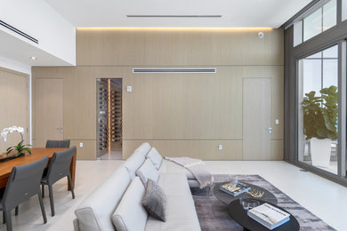 Living room - modern wall paneling living room idea in Miami