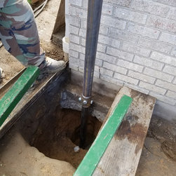 Helical pier install with Pier Tech cross bolt system - Products