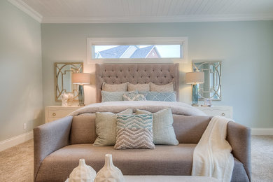 Large transitional master carpeted bedroom photo in Salt Lake City with blue walls, a standard fireplace and a tile fireplace