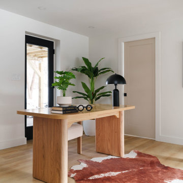 Where Work Meets Comfort: A Sunlit Office & Cozy Fireside Lounge