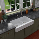 Karran USA - Karran Retrofit Farmhouse Quartz 34" Double Offset Bowl Sink, White - This retrofit farmhouse design with its shorter 6-1/2" apron blends function and form beautifully, and will look incredible in your kitchen. It is designed with a shorter apron to allow it to simply install into a standard 36" wide sink base cabinet. This practical design is available in a selection of 6 elegant color choices to compliment any decor.