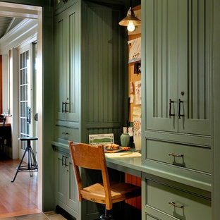 Design ideas for a country home office in Burlington with a built-in desk and slate floors.