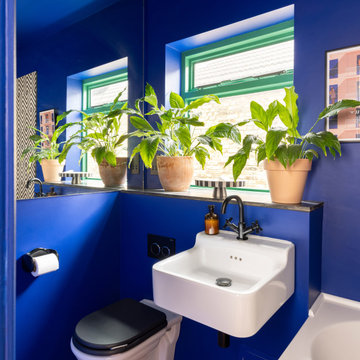 True blue bathroom makeover with black and white accents