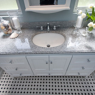 Elegant white tile and subway tile mosaic tile floor bathroom photo in Los Angeles with an undermount sink, beaded inset cabinets, white cabinets, granite countertops and blue walls