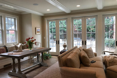 Example of a mid-sized transitional formal and open concept medium tone wood floor and beige floor living room design in DC Metro with beige walls, no fireplace and no tv