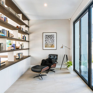 Inspiration för ett funkis vardagsrum, med grå väggar