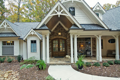 Example of a transitional exterior home design in Raleigh