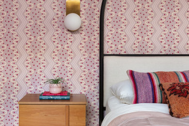 Example of an eclectic bedroom design in Austin