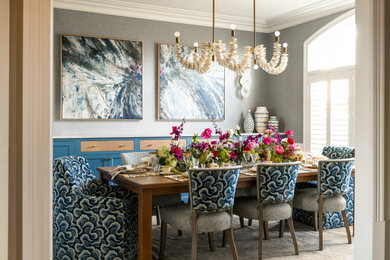 Example of a transitional dining room design in Other