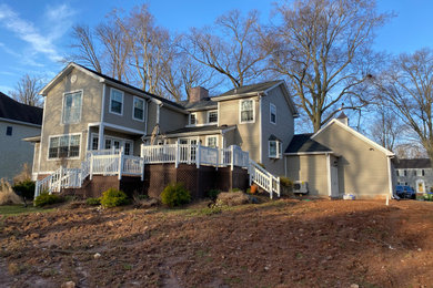 Mid-sized traditional house exterior idea in New York