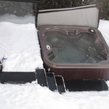 Glen leisurely strolls to his hot tub after a storm