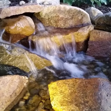 Dexter, MI Backyard Waterfeature and splash zone for kids