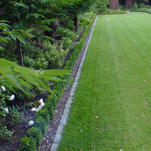 Idées déco pour un jardin classique avec des bordures.