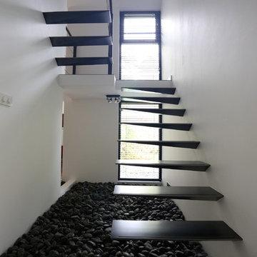 Floating stairs with triangular treads