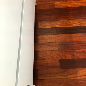Parquet padouk massif verni huilé — appartement résidentiel