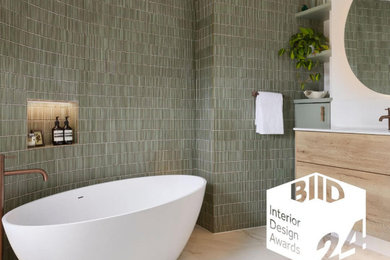 Medium sized contemporary bathroom in Sussex with a freestanding bath and a floating vanity unit.