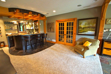 Example of a mountain style home bar design in Minneapolis