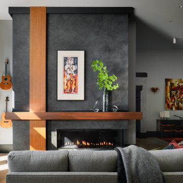 Two Story Custom Plastered Fireplace with a Walnut Mantle