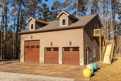 Inspiration for a large detached three-car garage workshop remodel in Other