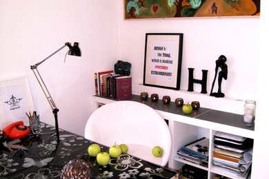 Example of a minimalist home office design in Other