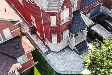 Driveway Extension, Walkway, and Back Patio with Interlocking Pavers