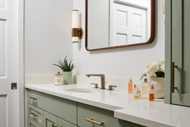 Bathroom - mid-sized modern master green tile and ceramic tile porcelain tile, brown floor and single-sink bathroom idea in Minneapolis with shaker cabinets, green cabinets, a bidet, white walls, an undermount sink, quartz countertops, white countertops, a niche and a built-in vanity