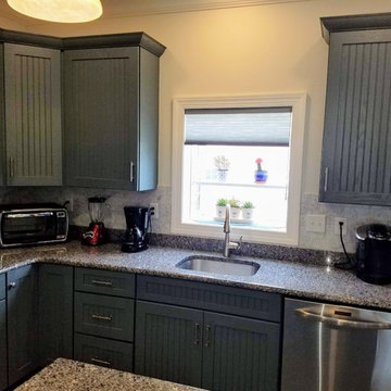 Medallion Cabinetry, Oak with Islander painted finish