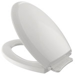Toto - Toto Guinevere Soft Close Slow Close Elong Toilet Seat and Lid, Colonial White - TOTO Guinevere SoftClose Non Slamming, Slow Close Elongated Toilet Seat and Lid,  is the latest in innovative smart seat technology. Constructed of solid, High-Impact Plastic, this unique seat is specifically designed to reduce injury and to eliminate annoying Toilet Seat Slam. The seat and lid utilize a built-in SoftClose hinge system, which lowers the seat and lid down to the bowl gently and quietly.  This seat is designed to match the TOTO Guinevere toilet, but would also complement other TOTO elongated toilets as well as other brands of elongated toilets.