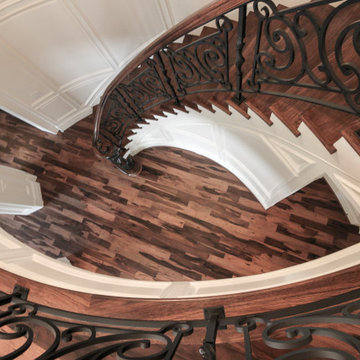 Project #74 | Circular Staircase with Hand-Forged Metal Panels