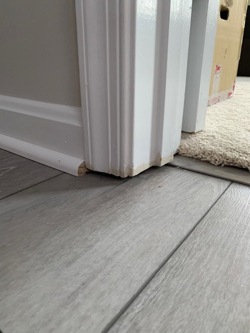 Replaced carpet with lux vinyl now there are large gaps under doors