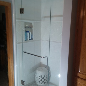 Ceramic Specialty Tile Shower with Herringbone Floor