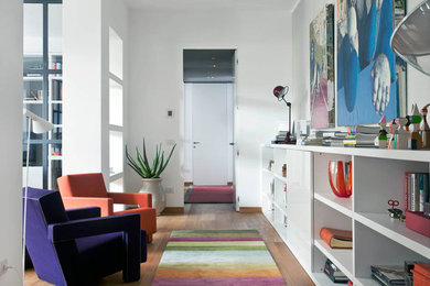 Design ideas for an eclectic family room in Milan.